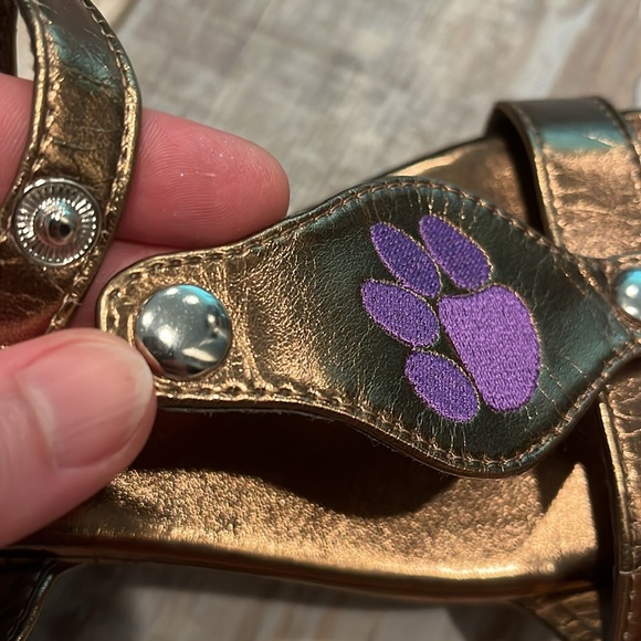 Never worn DBA gold wedges with removable purple tiger paw patches - Picture 6 of 6